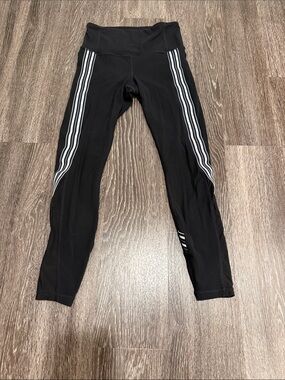 Athleta Black Leggings with White Side Stripe size - XL. Detail
